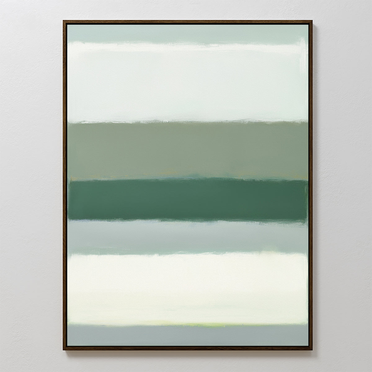 Sage Gradient Canvas Art - Vertical features soft, blended bands of muted sage green, gray, and off-white with a calming abstract look. Displayed in a thin dark frame against a light wall, it creates a serene focal point for any space.