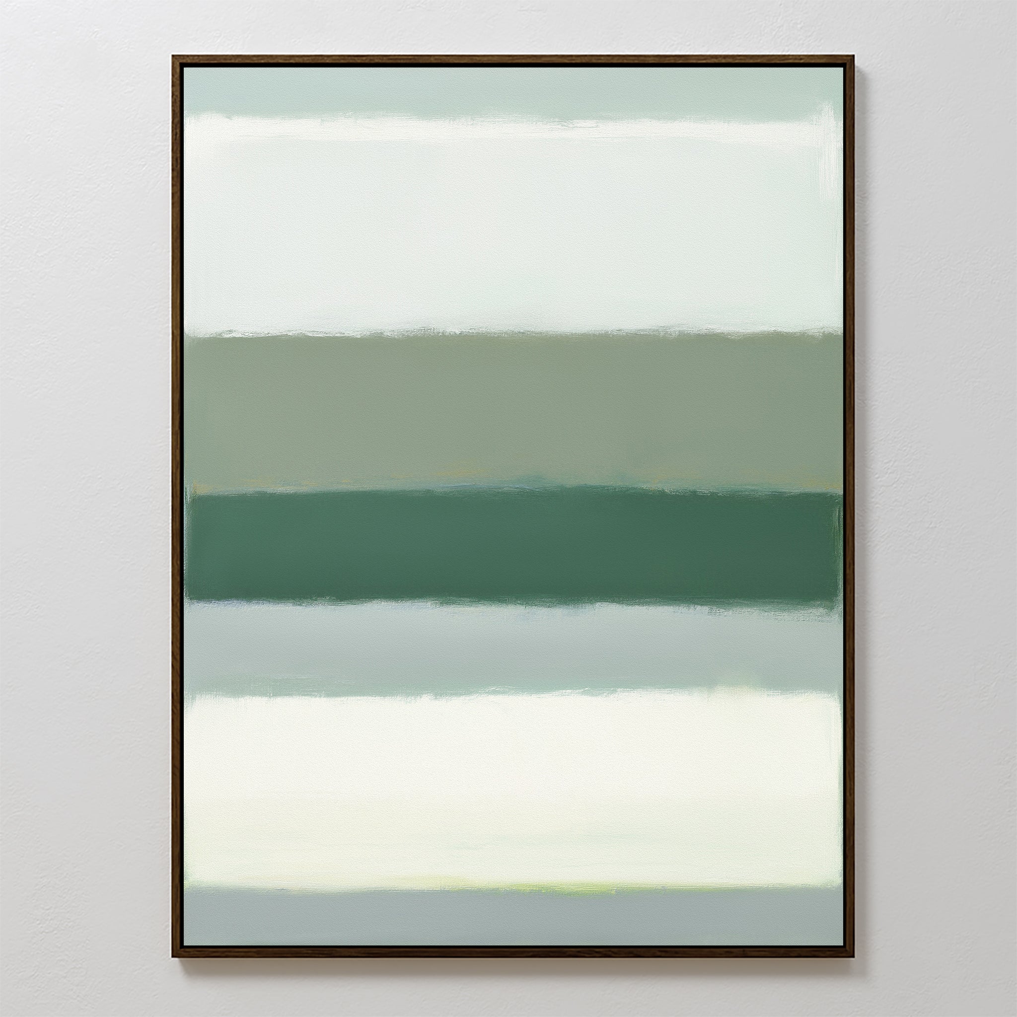 Sage Gradient Canvas Art - Vertical features soft, blended bands of muted sage green, gray, and off-white with a calming abstract look. Displayed in a thin dark frame against a light wall, it creates a serene focal point for any space.