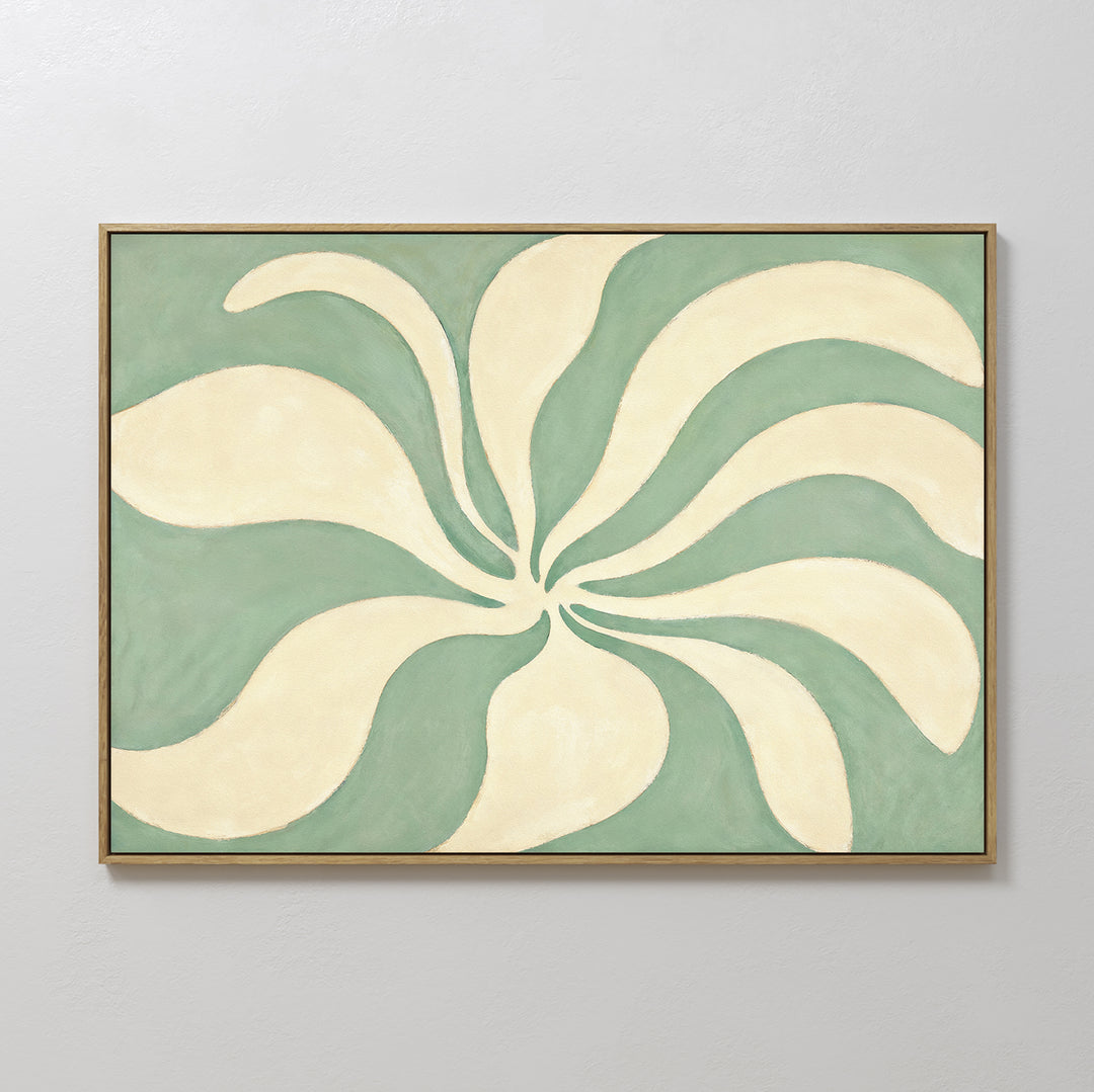 Sage Meditation Canvas Art - Horizontal features cream-colored, curved petal shapes radiating from the center on a muted sage green background, elegantly framed in light wood—perfect for enhancing your Nordic Park-inspired decor.