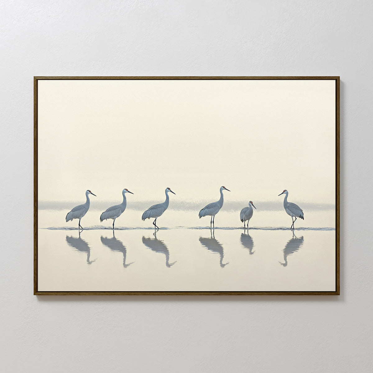 The Sandhill Procession Canvas Art - Horizontal features elegant cranes in shallow water with soft reflections, creating serene wall art perfect for any Nordic Park-inspired space.
