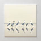 The Sandhill Procession Canvas Art - Square features six cranes standing in shallow water with their reflections, set against a soft, light background for a calm, minimalist look—perfect for bringing tranquility to your space.