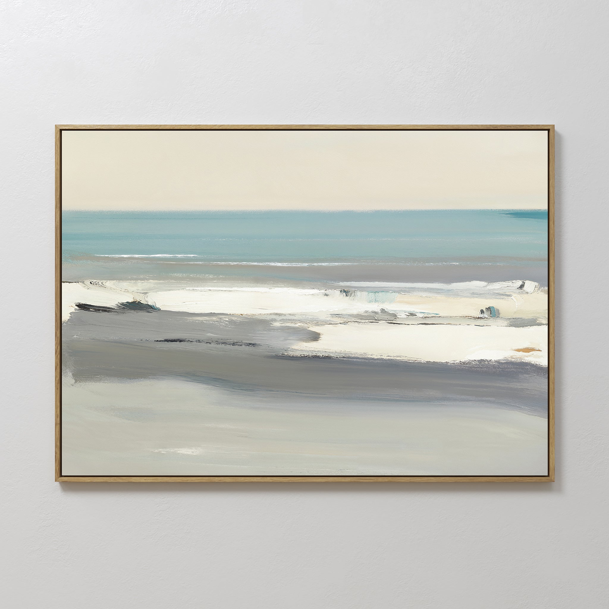 The Sandy Retreat Canvas Art - Horizontal features a framed abstract coastal scene with soft blue, gray, and white brushstrokes, capturing the essence of waves and sky under gentle light.