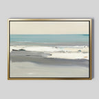 Sandy Retreat Canvas Art - Horizontal features an abstract seascape in soft blue, gray, and white tones with calm waves and a sandy shore. Framed in gold on a light gray background, it brings serene coastal vibes to your space.