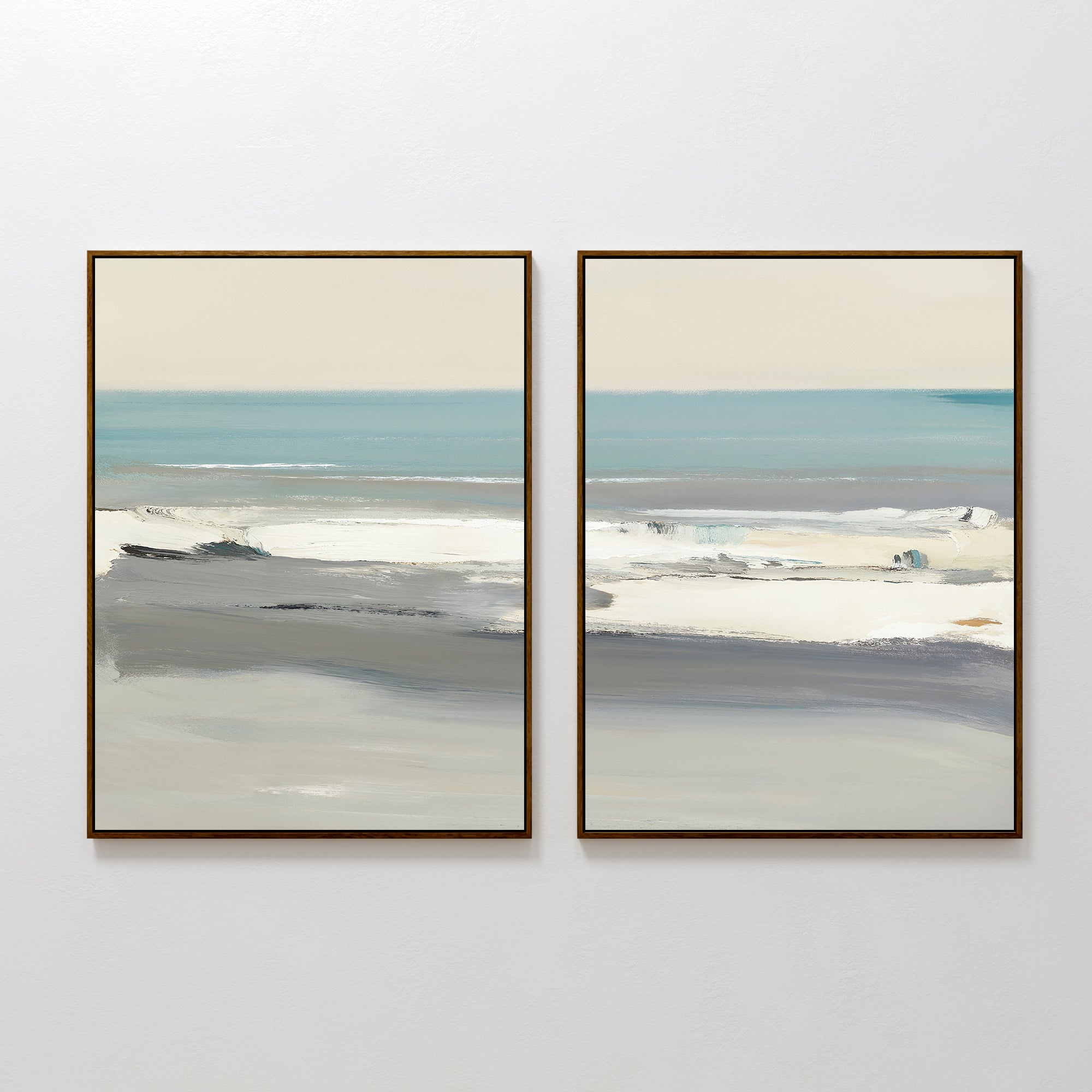 Sandy Retreat - Set Of 2 features two framed abstract paintings in soft blue, gray, and white tones. This minimalist beachscape evokes peaceful seaside vibes with serene waves and sky, perfect for adding calm to any space.