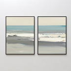The Sandy Retreat - Set Of 2 features framed abstract beachscape art in soft blue, gray, and beige tones, depicting calm ocean waves and a serene beach under a pale sky, displayed side by side on a white wall.