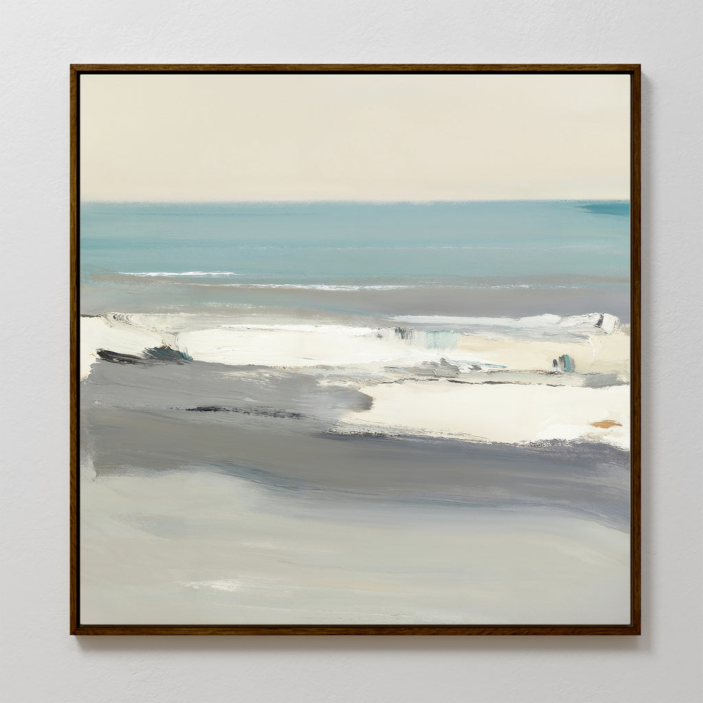 The Sandy Retreat Canvas Art - Square features a framed abstract seascape with soft blue, gray, and white shades. Calm ocean waves beneath a light sky create minimalistic, serene coastal vibes—perfect for a relaxing décor update.