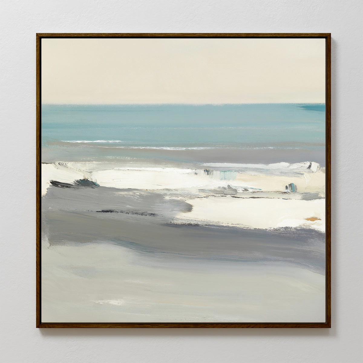 The Sandy Retreat Canvas Art - Square features a framed abstract seascape with soft blue, gray, and white shades. Calm ocean waves beneath a light sky create minimalistic, serene coastal vibes—perfect for a relaxing décor update.