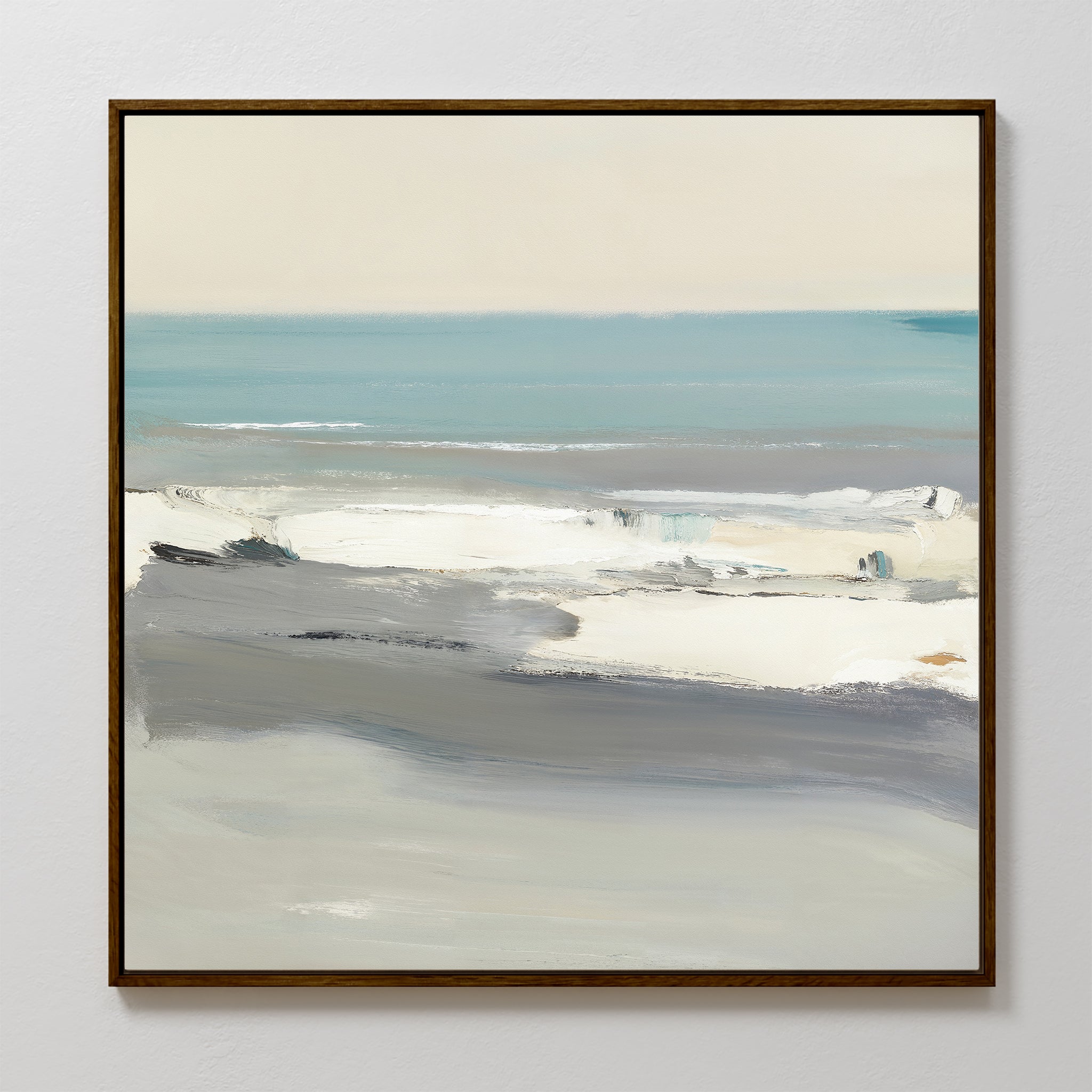 The Sandy Retreat Canvas Art - Square features a framed abstract seascape with soft blue, gray, and white shades. Calm ocean waves beneath a light sky create minimalistic, serene coastal vibes—perfect for a relaxing décor update.
