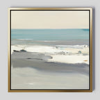 The Sandy Retreat Canvas Art - Square features an abstract seascape in soft blue and white tones with gentle waves and a calm sky. Framed in gold, this tranquil coastal print adds a serene touch to any room's décor.