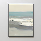 The Sandy Retreat Canvas Art - Vertical features an abstract seascape with soft blues, grays, and whites, depicting waves and sky. This coastal print comes in a simple black frame and is displayed against a white wall.