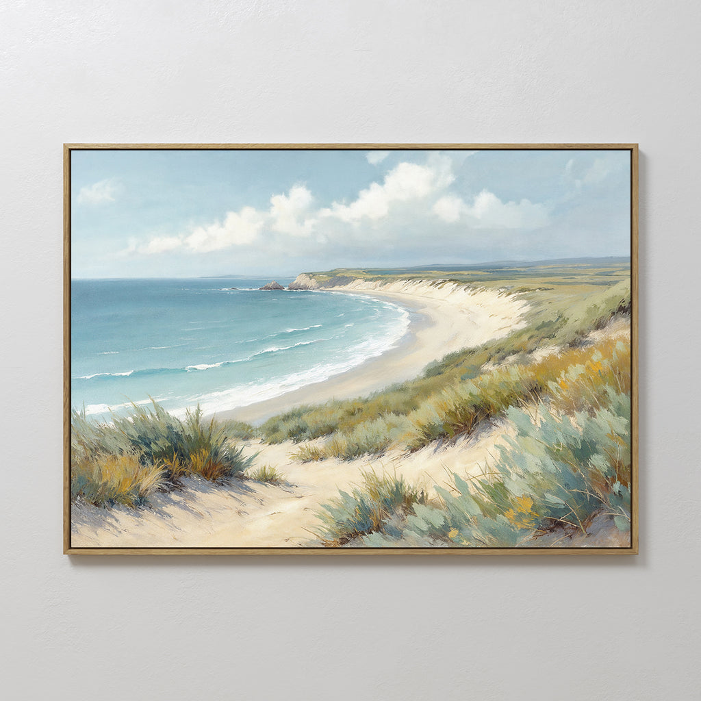 The Sandy Shores Canvas Art - Horizontal features a sandy beach with dunes, grass, blue ocean waves, and a partly cloudy sky—an elegant framed canvas print for any space.
