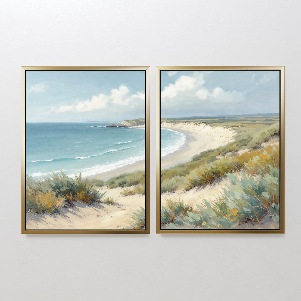Sandy Shores - Set of 2 features two framed paintings side by side, showing a tranquil coastal landscape with sandy dunes, green grasses, blue waves, and a cloudy sky—ideal beach wall art for any room.