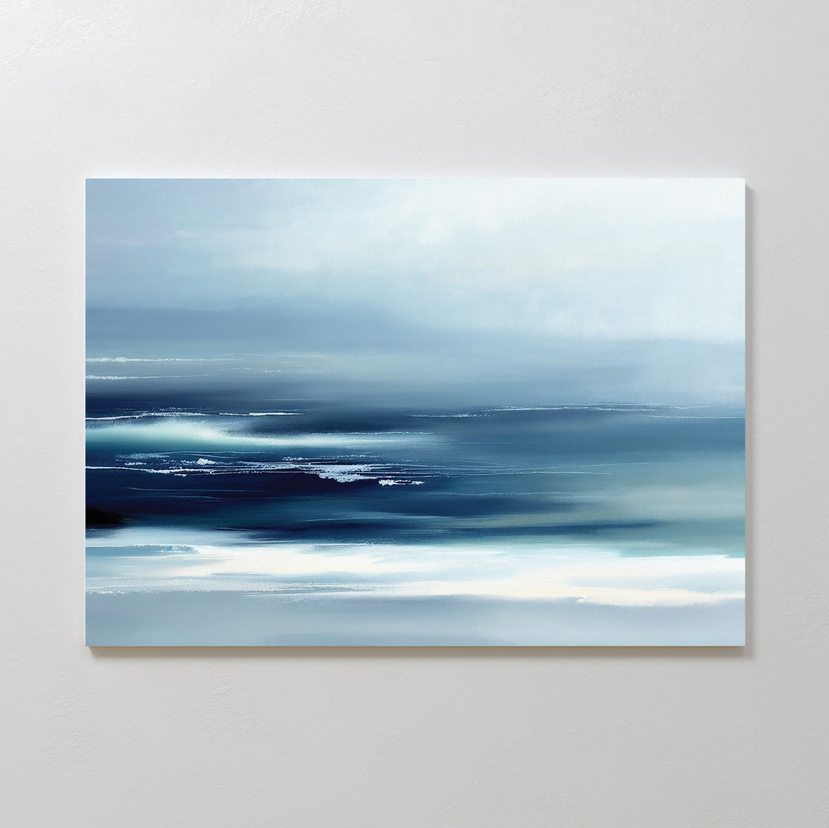 Sapphire Current Canvas Art - Horizontal features soft, blended shades of blue, white, and gray with smooth brushstrokes, evoking a misty seascape and creating a calming atmosphere perfect for any space.