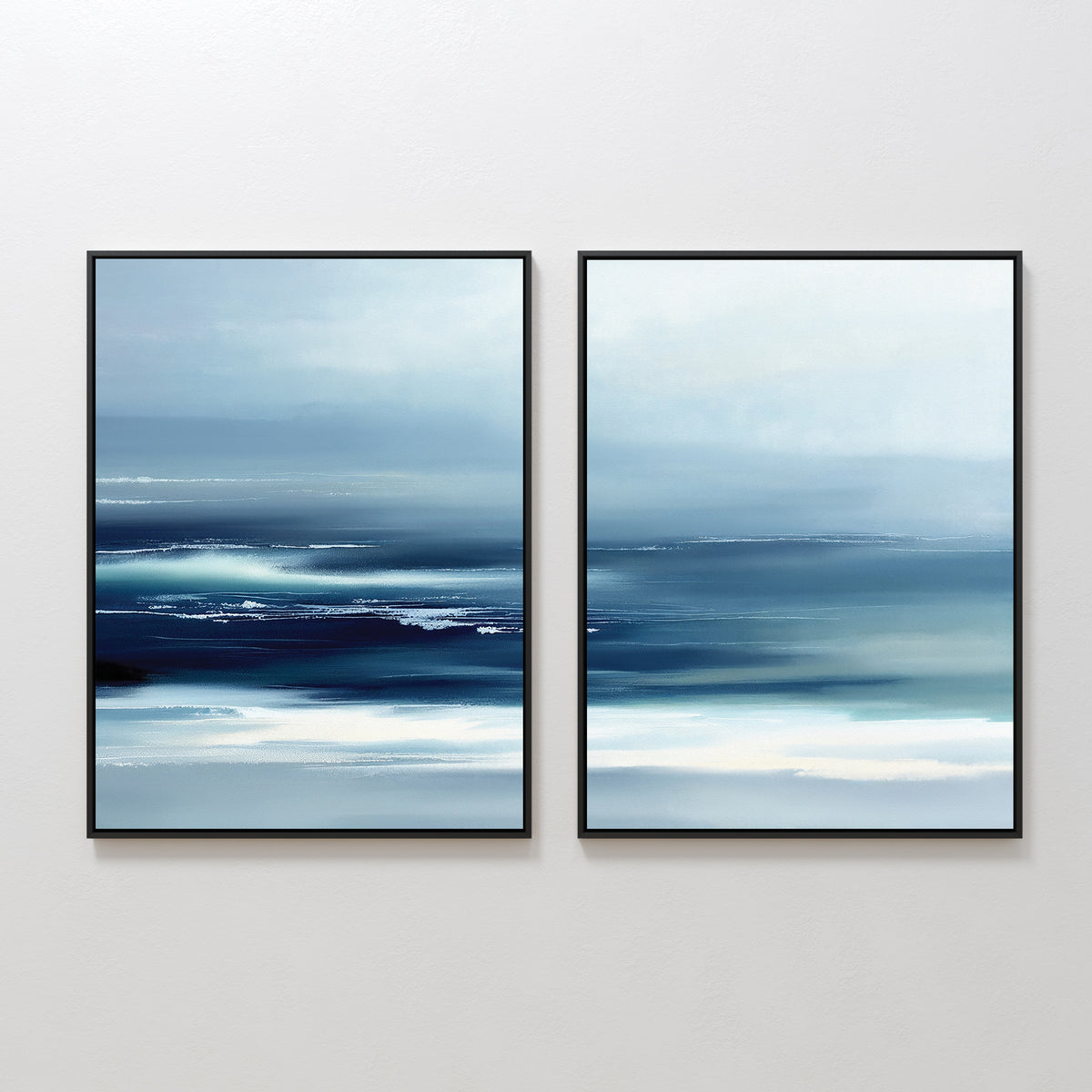 The Sapphire Current - Set of 2 features square blue and white abstract prints with soft, blended brushstrokes that evoke a tranquil seascape or misty Nordic horizon, displayed side by side on a white wall.