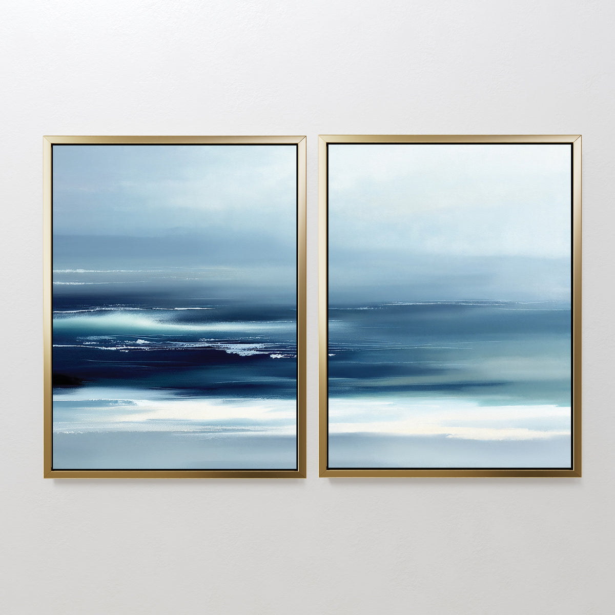 The Sapphire Current - Set Of 2 features abstract art in gold frames with soft, horizontal streaks of blue, white, and navy. These tranquil pieces evoke a serene seascape, blending minimal design and calming colors—ideal for Nordic Park-inspired decor.