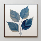 Sapphire Leaves Canvas Art - Square: a framed canvas print with a minimalist botanical design featuring five blue-toned leaves with beige accents on thin stems, set against a white background.