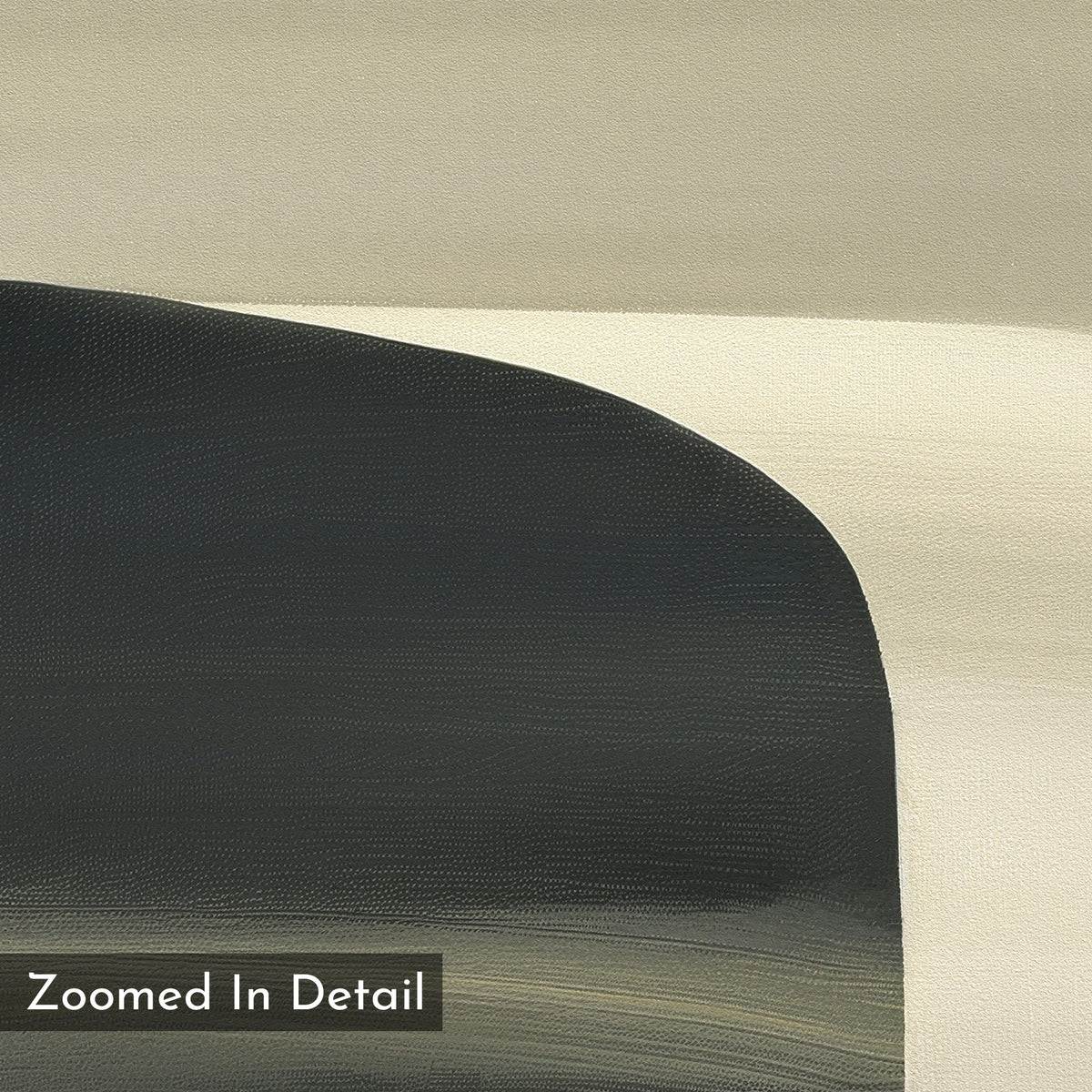 A detailed close-up of the Sculptural Forms Canvas Art - Square, showcasing overlapping curved shapes in beige, black, and gray on a textured canvas—ideal for modern or minimalist spaces. The text Zoomed In Detail is shown at the bottom left.