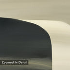 Sculptural Forms Canvas Art - Vertical features abstract curved, overlapping shapes in black, gray, beige, and cream. This minimalist piece with smooth transitions suits modern living rooms. "Zoomed In Detail" is labeled at the bottom left.