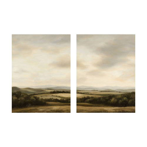 Beneath The Clouds minimalist wall art features two landscape paintings displayed side-by-side, showing rolling hills and fields under a cloudy sky.