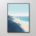 Shifting Tides Canvas Art - Vertical is a framed coastal print featuring light sand, gentle blue ocean waves, and a pale sky with dark blue shadows—minimal details give it a serene, abstract look ideal for seaside wall décor.