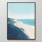 The Shifting Tides Canvas Art - Vertical features a tranquil beach scene with soft blue skies, turquoise waves, sandy shore, and dark blue cliffs in the foreground, all viewed from an elevated perspective.