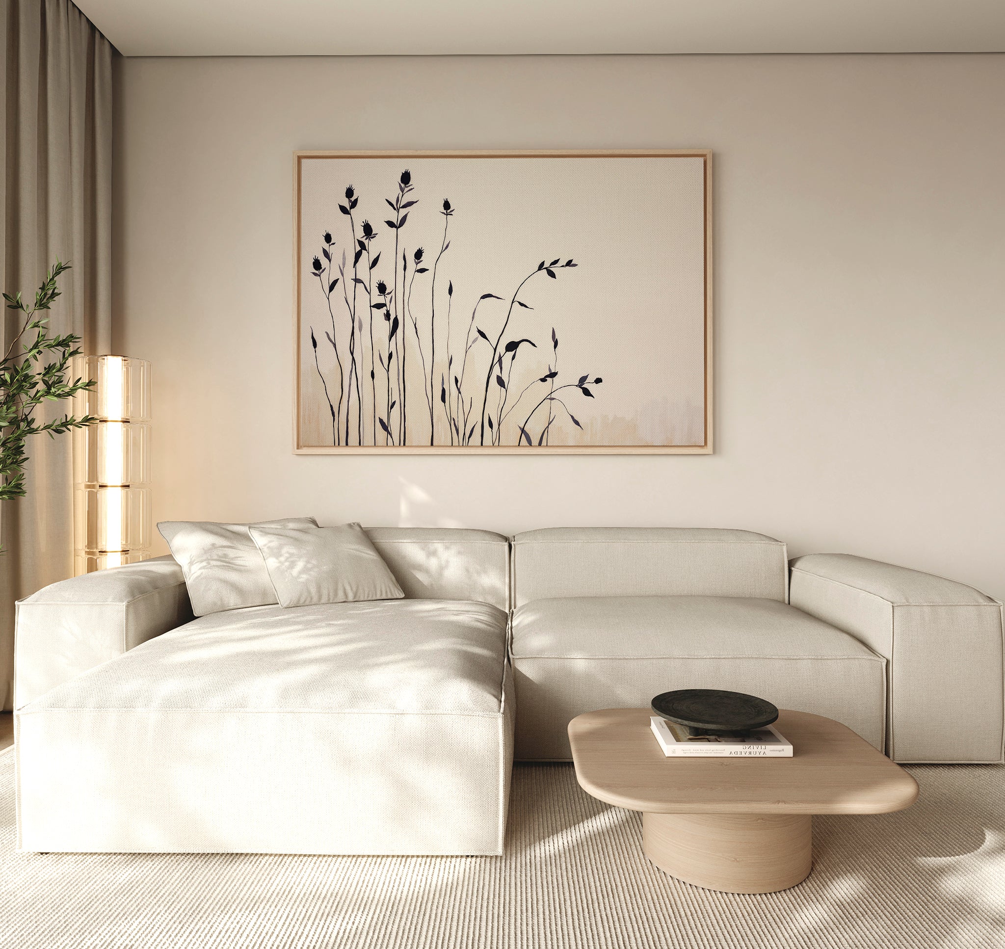 Minimalist living room featuring a light beige sectional, Nordic decor, wooden coffee table with dark bowl, soft natural light, and neutral tones. The serene space is completed by Silhouette Meadow Canvas Art - Horizontal and a leafy plant.