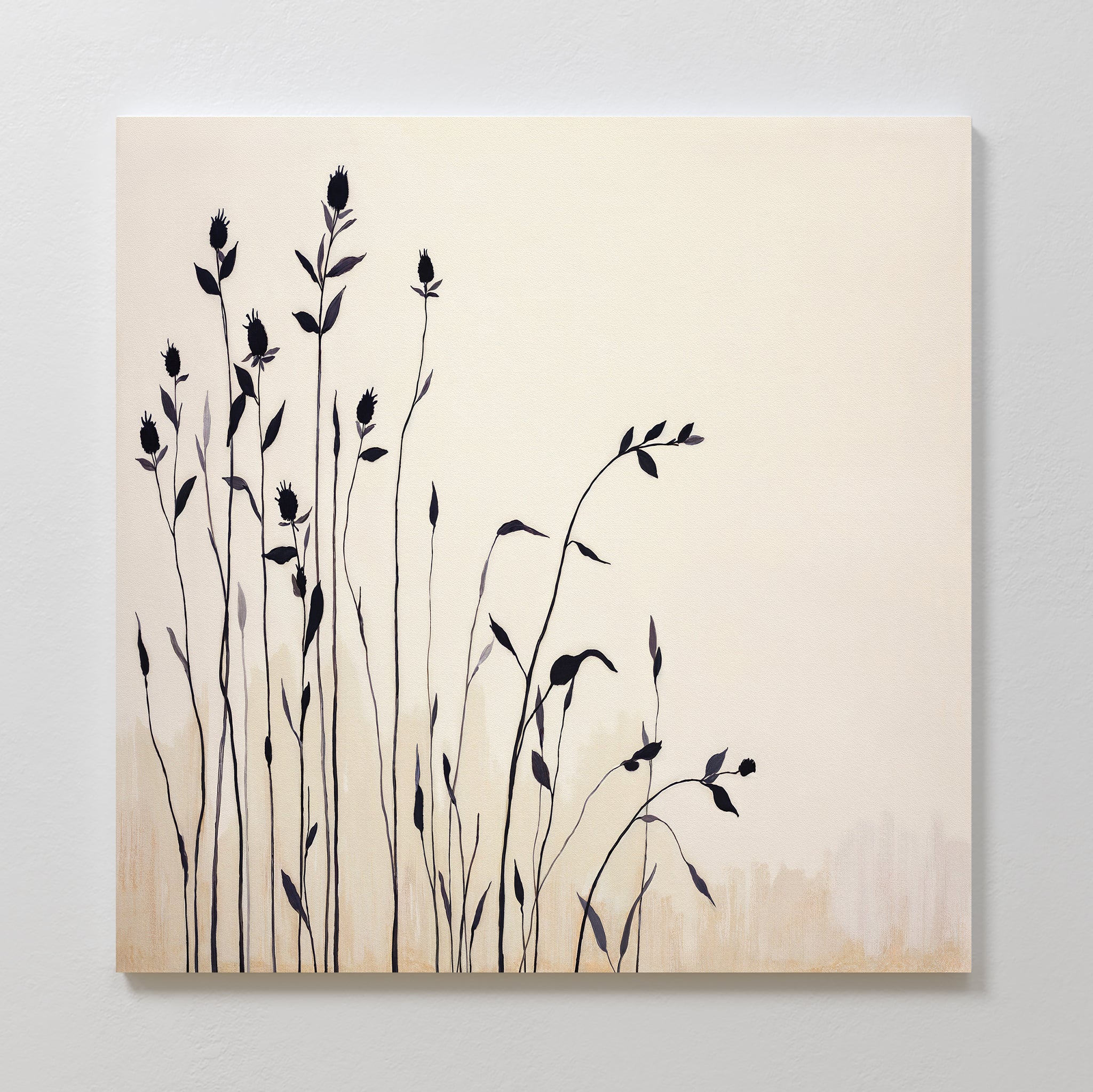 The Silhouette Meadow Canvas Art - Square showcases tall, thin black wildflower silhouettes on a light cream and beige background. This minimalist botanical wall art adds an elegant Nordic touch to any room.