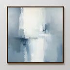 Silver Cross Formation Canvas Art - Square features soft, blurred shades of blue, white, and gray with soothing vertical and horizontal brushstrokes. Framed in dark wood, it's ideal for modern living rooms and tranquil spaces.