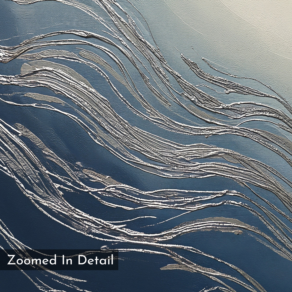 Silver Current Canvas Art - Vertical features textured silver lines flowing over blue and gray, forming a wave-like pattern. Contemporary and sophisticated, it's perfect wall art. "Zoomed In Detail" appears in a black box at the bottom left corner.