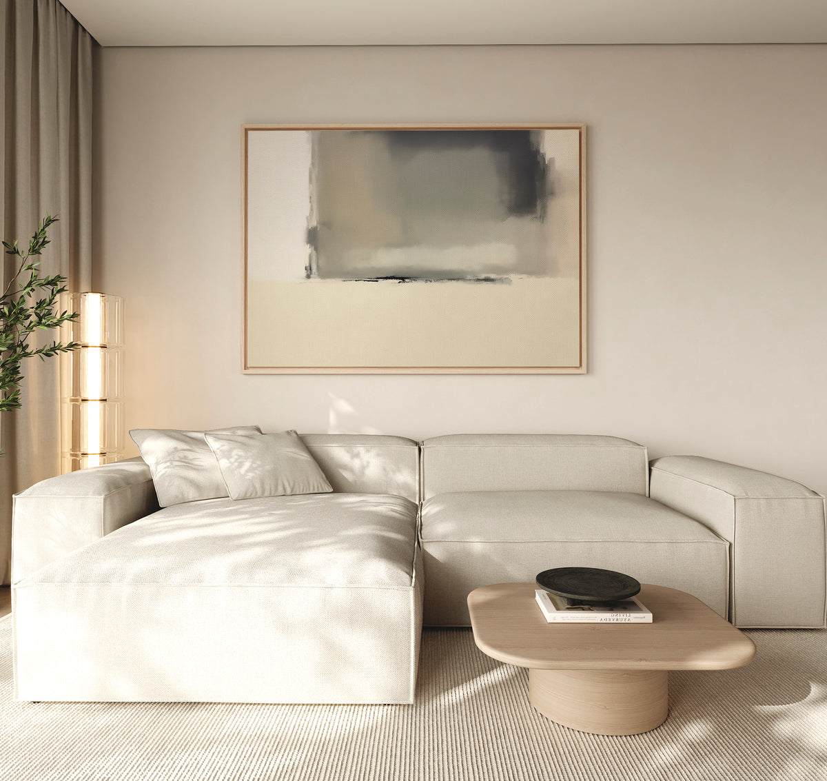 A modern living room features a beige sectional sofa, a low wooden coffee table with a dark bowl, and the Smoke Boundary Canvas Art - Horizontal above. A tall plant and natural light boost the calm atmosphere with soothing neutral tones.