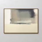 Smoke Boundary Canvas Art - Horizontal features soft, blurred shapes in gray, beige, and cream with a subtle gradient and dark central accent. It comes framed in a slim, dark border and looks striking against a light wall.