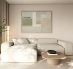 A modern living room featuring a light beige sectional, a low wooden coffee table with books and a bowl, neutral walls, sheer curtains, a tall plant in the corner, and Soft Geometric Planes Canvas Art - Horizontal on the wall.