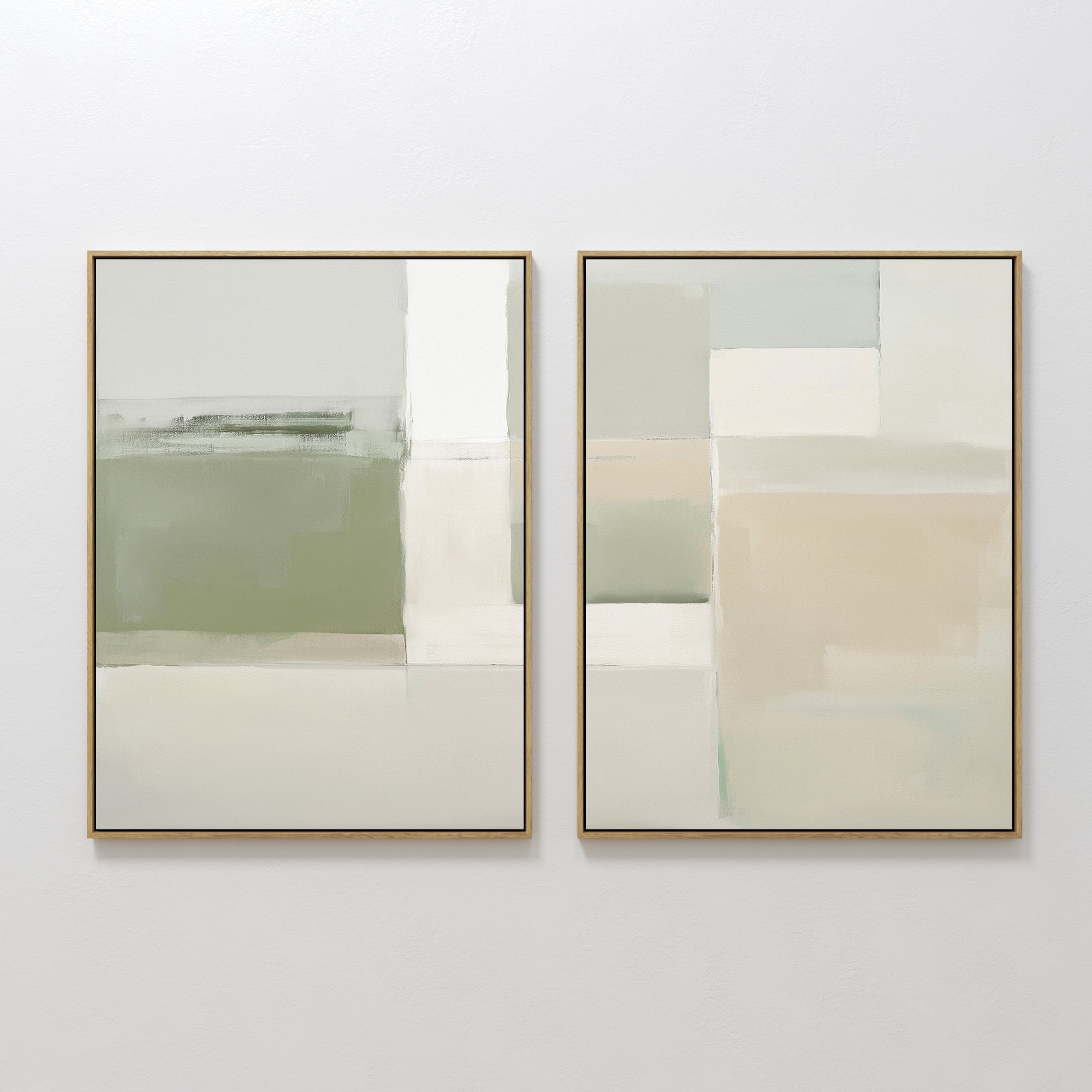 The Soft Geometric Planes - Set Of 2 features geometric wall art with muted green, beige, grey, and white tones in rectangular and square shapes, displayed side by side in slim gold frames on a plain white wall.
