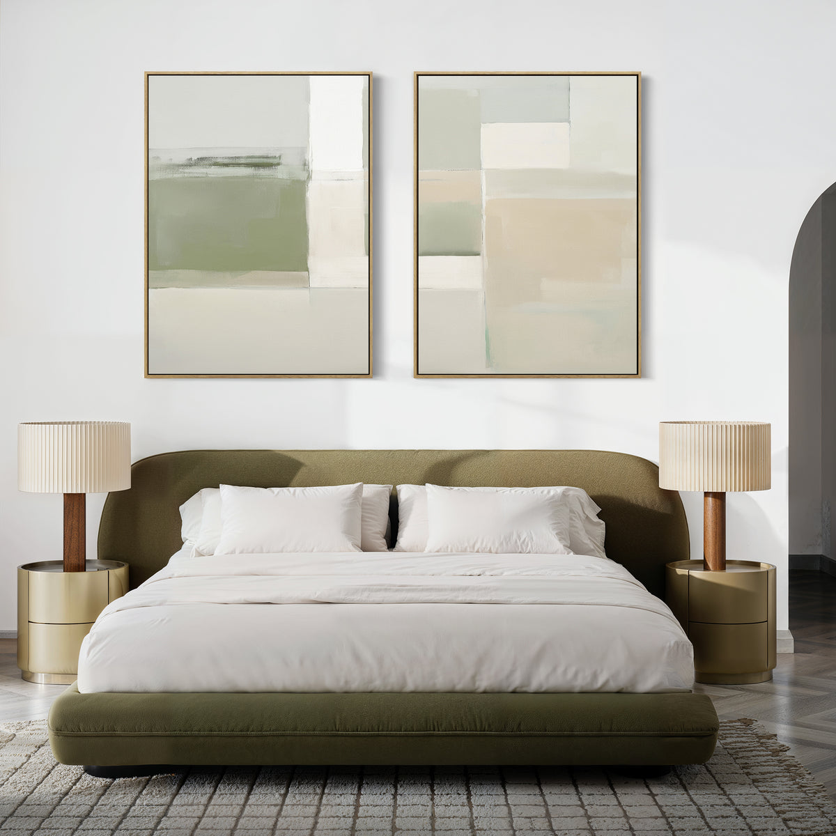 A modern bedroom with an olive green bed, white bedding, two round gold nightstands with beige lamps, and the Soft Geometric Planes - Set Of 2 prints in green and beige hanging above the headboard.