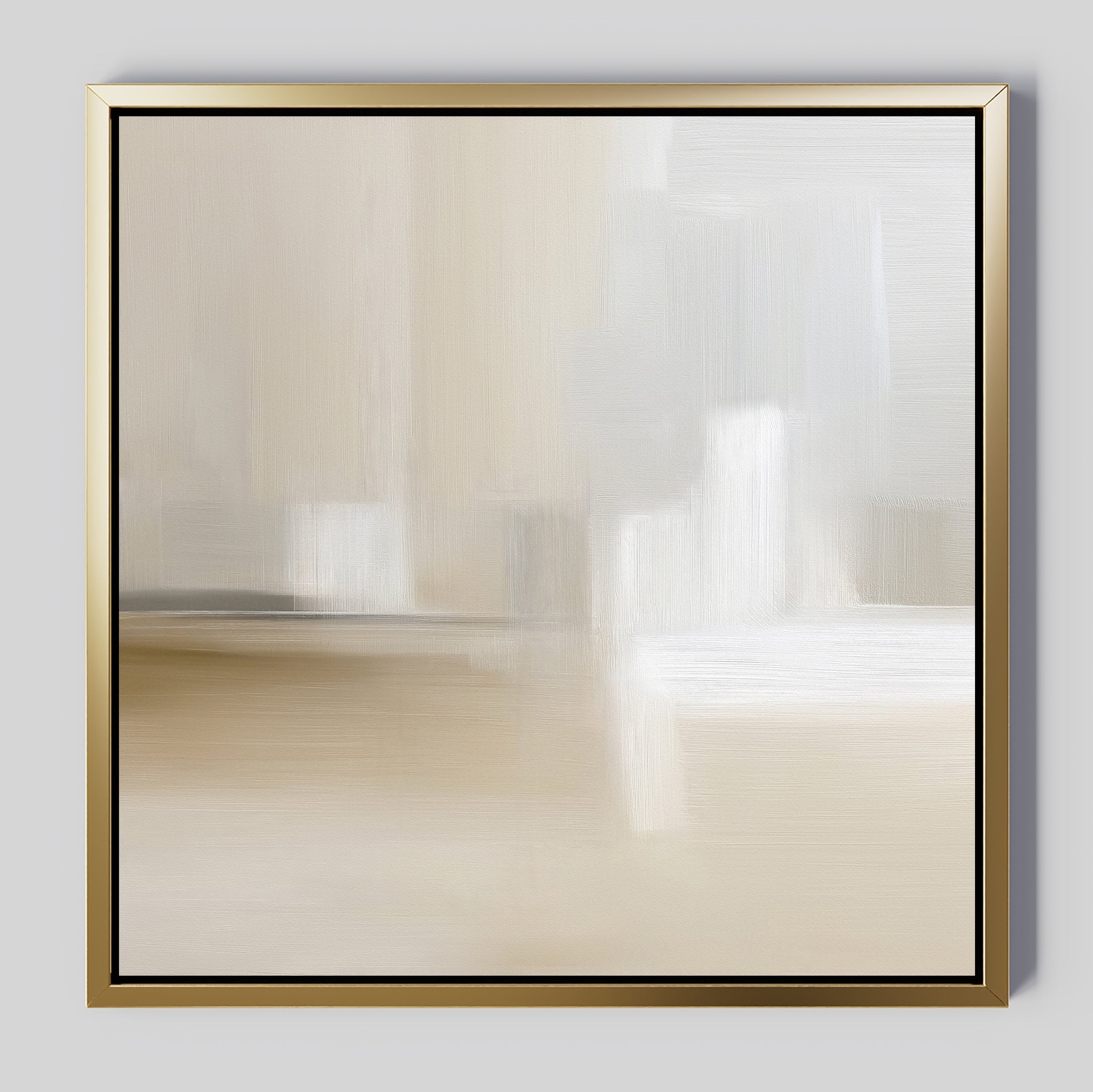 Soft Layers Canvas Art - Square features soft beige, cream, and white brushstrokes in a minimalist abstract style with a gold frame, displayed on a light gray wall—ideal neutral wall art for contemporary spaces.