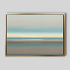 The Soft Tide Layers Canvas Art - Horizontal features abstract landscape bands in soft blue, beige, and gray tones. This calming print is framed with a simple gold border and displayed on a light gray wall.