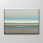The Soft Tide Layers Canvas Art - Horizontal is a minimalist abstract print in a black frame with soft blue, beige, and tan bands, evoking a serene seascape—ideal tranquil wall art for any light-colored space.