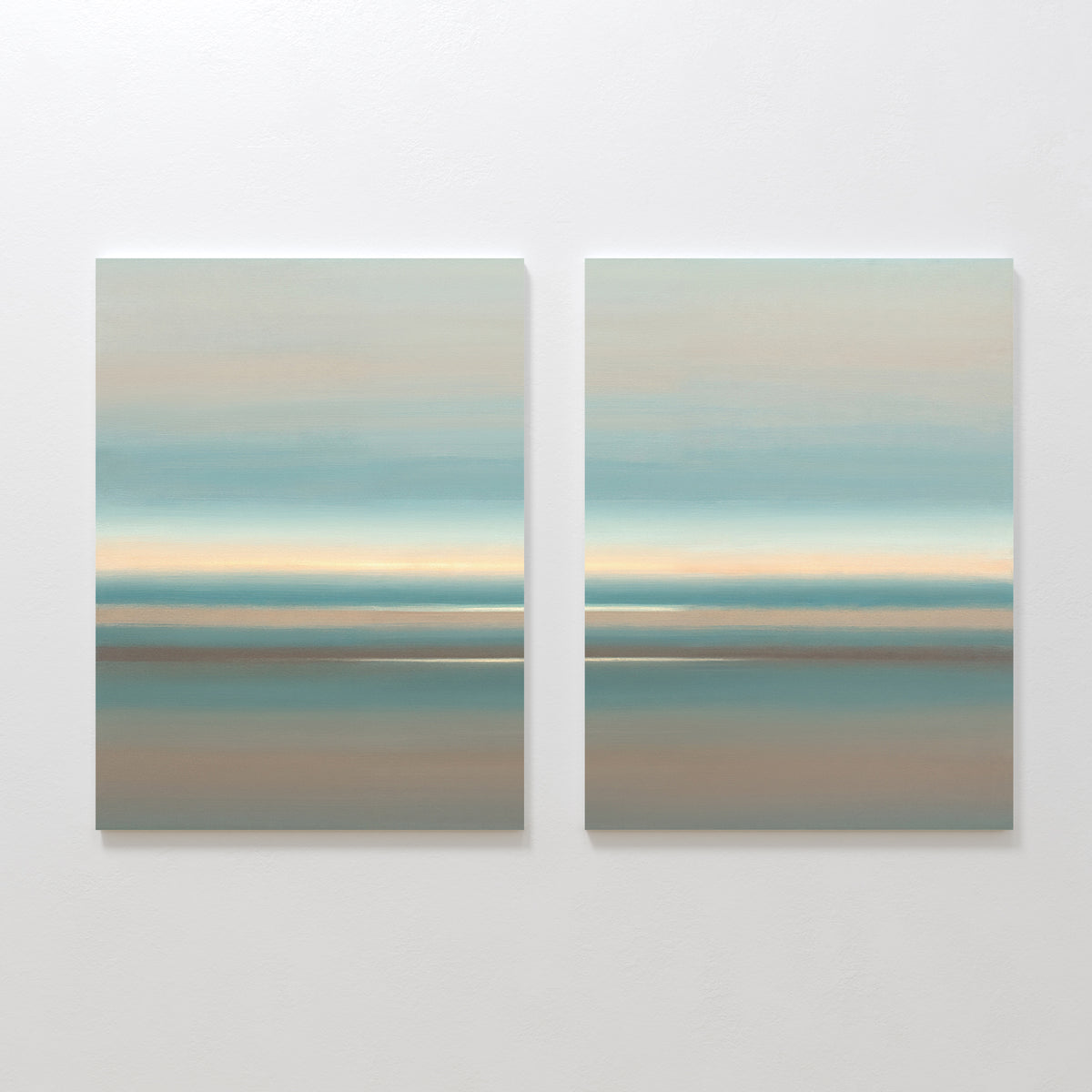 The "Soft Tide Layers - Set Of 2" features abstract prints with soft horizontal bands in blue, teal, beige, and brown—evoking a serene coastal feel and adding minimalist style to any space.
