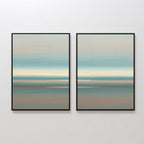 The Soft Tide Layers - Set Of 2 features framed abstract prints with soft horizontal bands of blue, beige, and brown, hanging side by side for a calming, coastal-inspired wall art display.