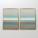 The Soft Tide Layers - Set Of 2 features calming abstract prints with pastel blue, beige, and brown horizontal bands that evoke a serene landscape or seascape, perfect for coastal wall decor. Displayed side by side on a white wall.