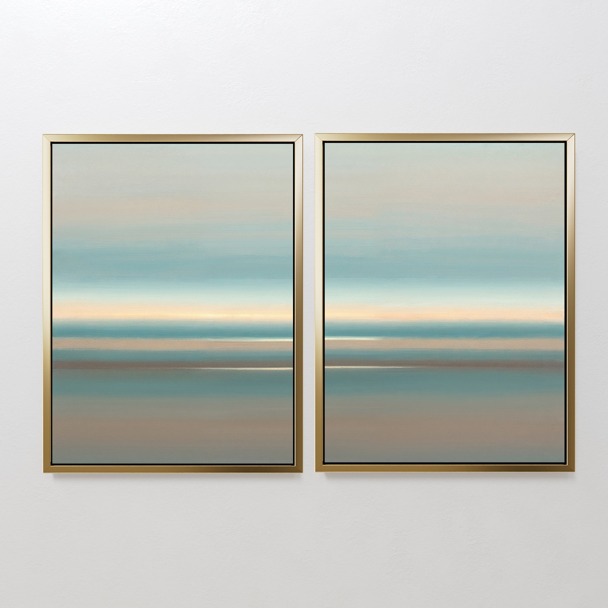 The Soft Tide Layers - Set Of 2 features calming abstract prints with pastel blue, beige, and brown horizontal bands that evoke a serene landscape or seascape, perfect for coastal wall decor. Displayed side by side on a white wall.