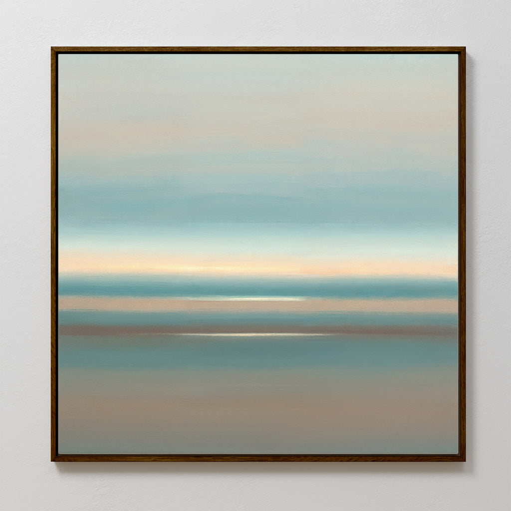 Soft Tide Layers Canvas Art - Square features calming blended bands of blue, beige, and light gray, evoking a serene seascape. This framed wall art adds a subtle touch of coastal style with its soothing tones and soft light at the center.