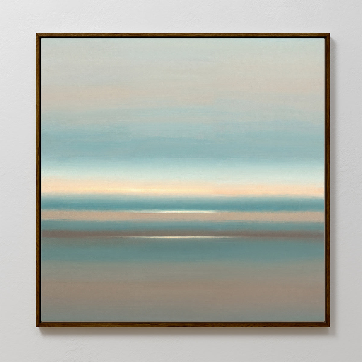 Soft Tide Layers Canvas Art - Square features calming blended bands of blue, beige, and light gray, evoking a serene seascape. This framed wall art adds a subtle touch of coastal style with its soothing tones and soft light at the center.