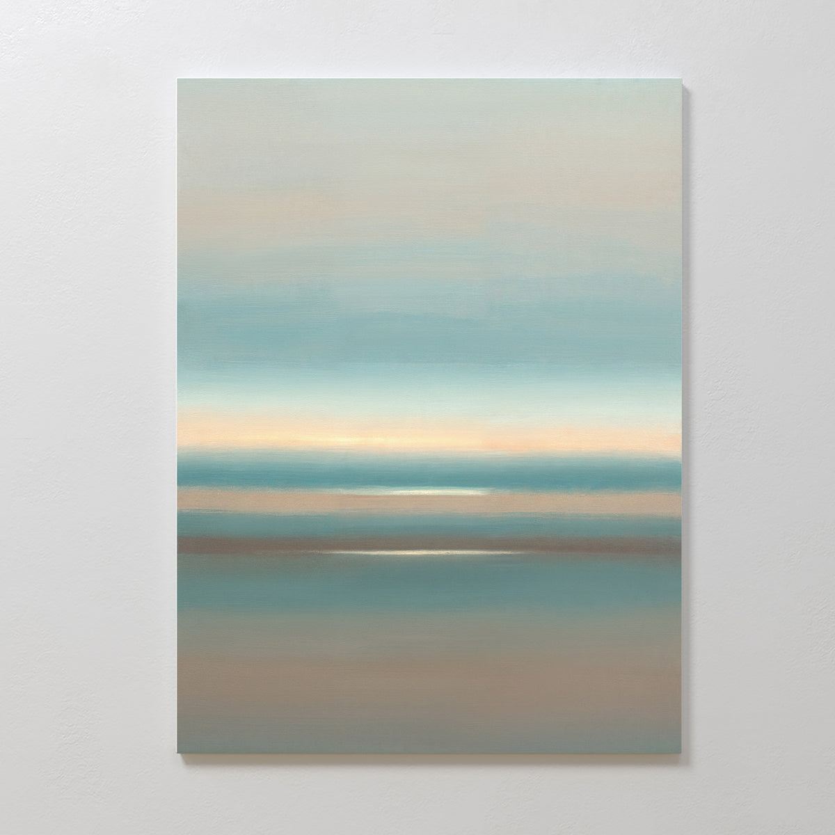 The Soft Tide Layers Canvas Art - Vertical features minimalist, blended horizontal bands of blue, beige, and light brown, evoking a serene seascape—perfect as calming coastal wall art for any tranquil home décor.