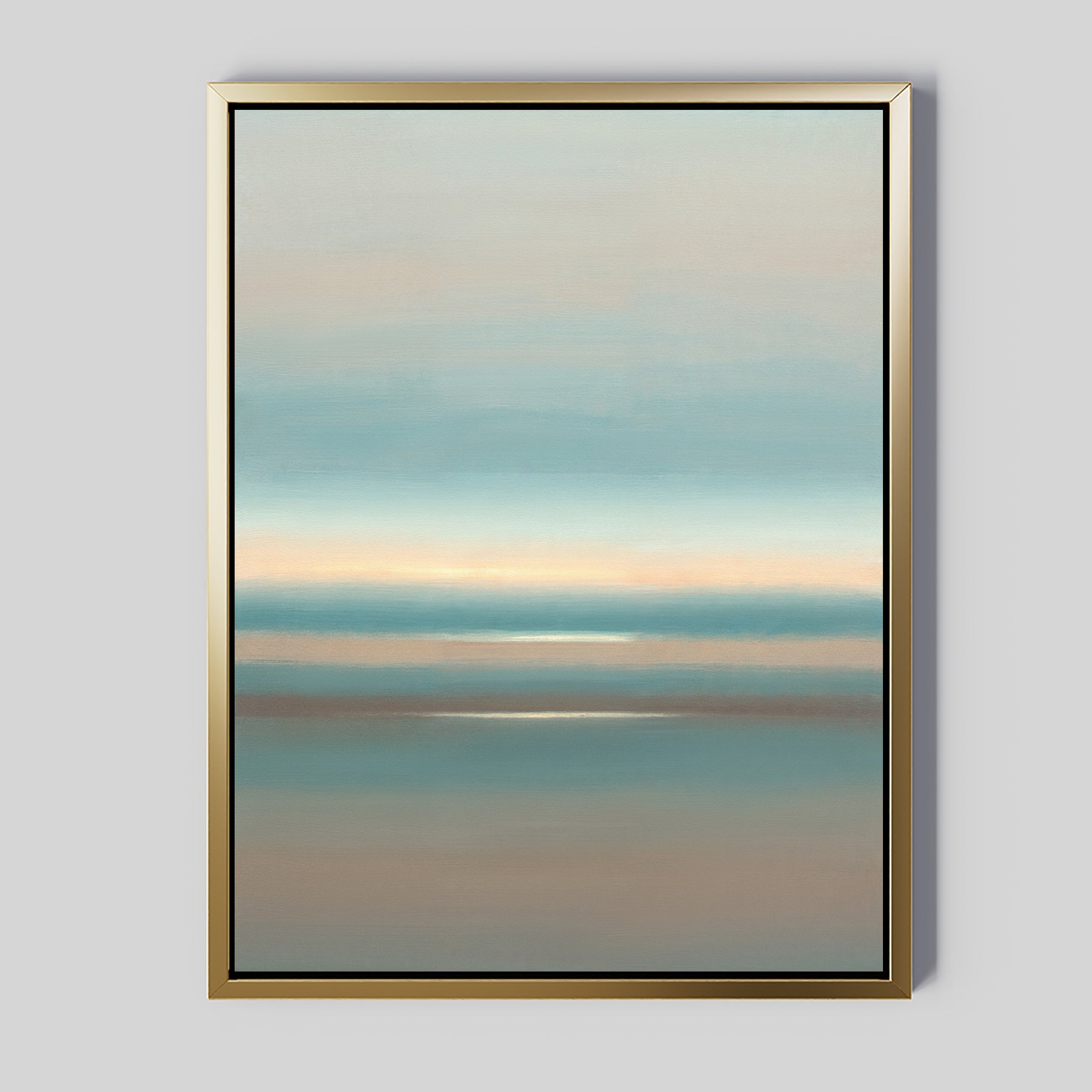 The Soft Tide Layers Canvas Art - Vertical features calming pastel blue, beige, and gray bands, evoking a serene seascape. Its metallic gold frame stands out against a light gray background, making it perfect as coastal wall art.
