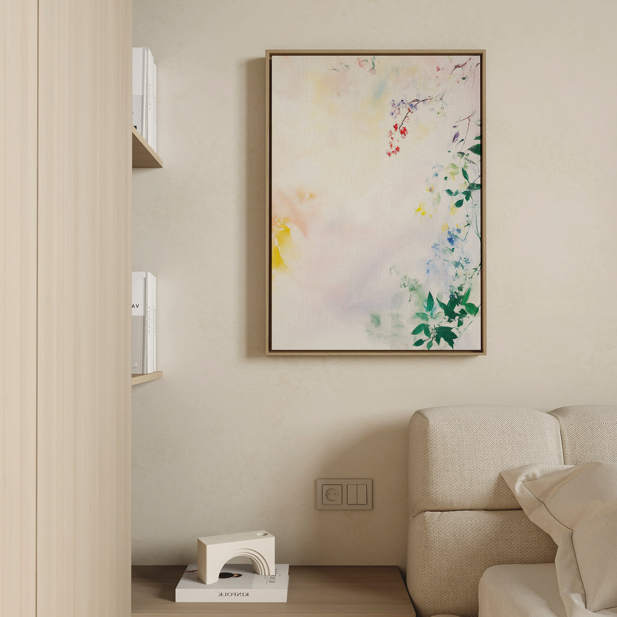 A minimal living room corner with a beige couch, light wood shelves, a small white décor piece, and the vibrant "Spring Reverie Canvas Art - Vertical" adding a splash of color to the space.