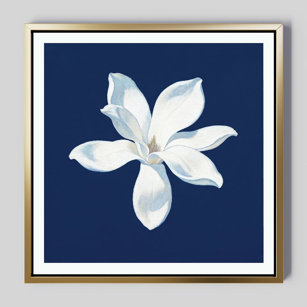 The Starlit Magnolia Canvas Art - Square features a white six-petal magnolia centered on dark blue with a gold frame, making it an ideal contemporary wall décor or canvas print for Nordic Park-inspired interiors.