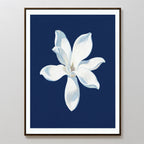 The Starlit Magnolia Canvas Art - Vertical showcases a white magnolia with delicate petals on a deep blue background, creating an elegant piece of contemporary wall decor inspired by Nordic Park style.