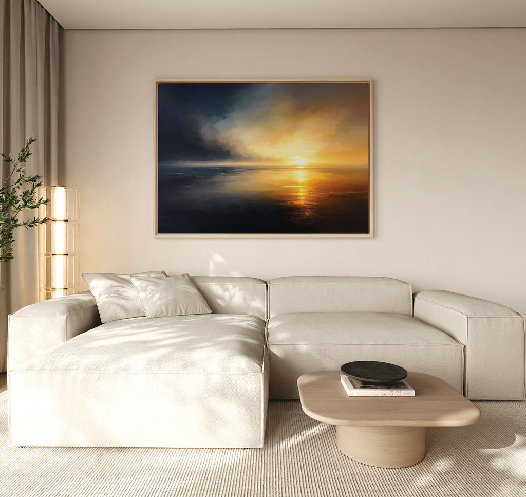 A modern living room featuring a large beige sectional sofa, a low wooden coffee table, and the Storm's Edge Canvas Art - Horizontal displayed above the sofa. Soft natural light enhances the space’s atmospheric vibe.