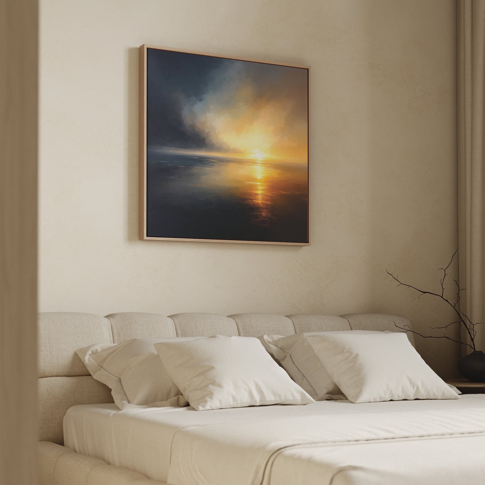 A beige bedroom features a cushioned headboard, neatly made bed with white pillows and sheets, and the Storm's Edge Canvas Art - Square above the bed. A small bare branch decorates the side table.